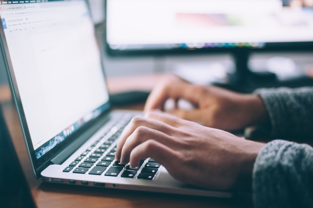 person at computer registering